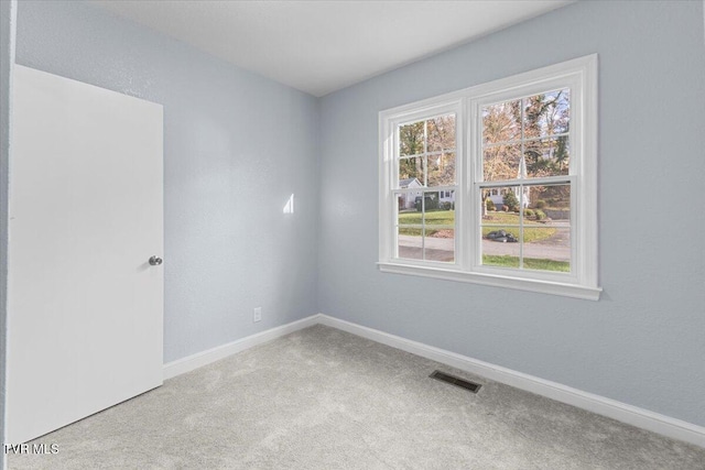 view of carpeted spare room