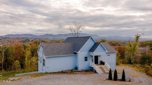 view of front of home with a mountain view