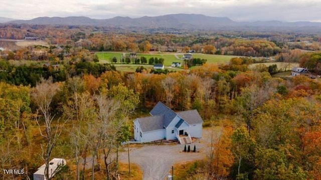 drone / aerial view featuring a mountain view