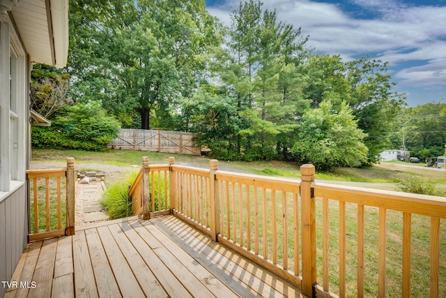 deck featuring a lawn