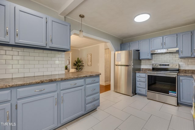 kitchen with pendant lighting, decorative backsplash, ornamental molding, and stainless steel appliances