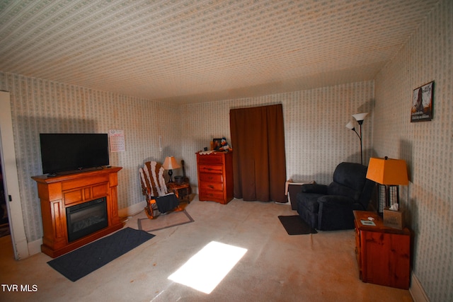 living area with light carpet