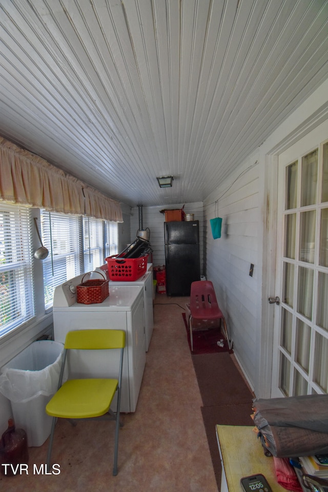 dining space with washer and clothes dryer