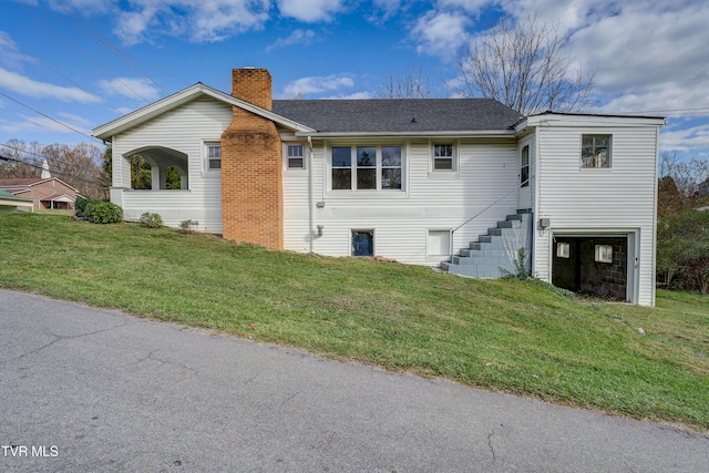 view of front of home with a front yard