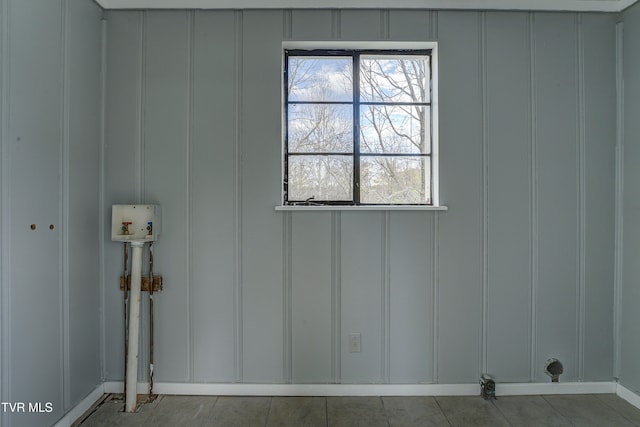 clothes washing area with washer hookup and tile patterned floors