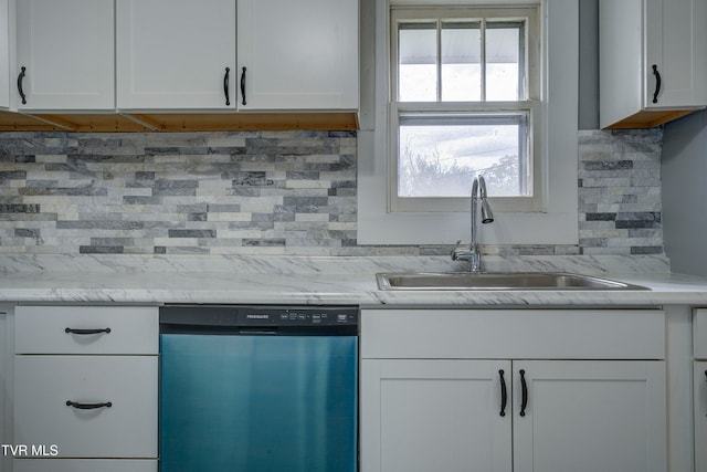 kitchen with plenty of natural light, sink, backsplash, and dishwasher