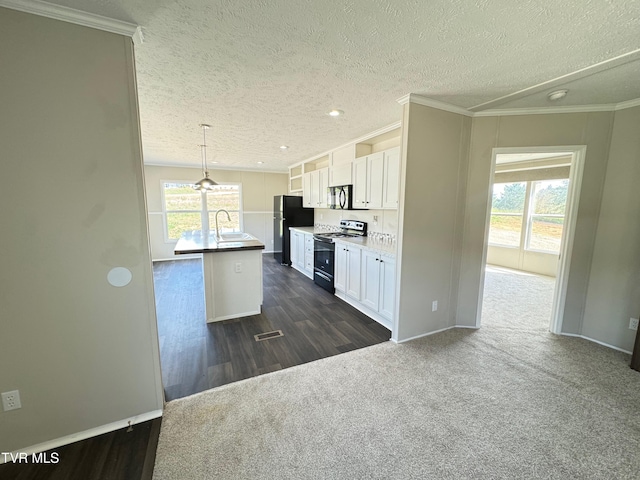 kitchen featuring black appliances, white cabinetry, hanging light fixtures, an island with sink, and dark wood-type flooring