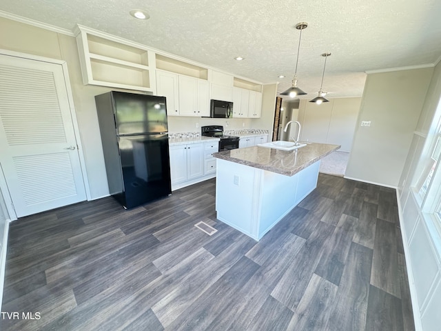 kitchen featuring black appliances, white cabinetry, decorative light fixtures, dark hardwood / wood-style flooring, and an island with sink