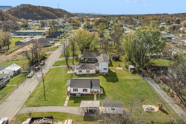 drone / aerial view featuring a mountain view