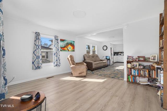 living room with light hardwood / wood-style floors