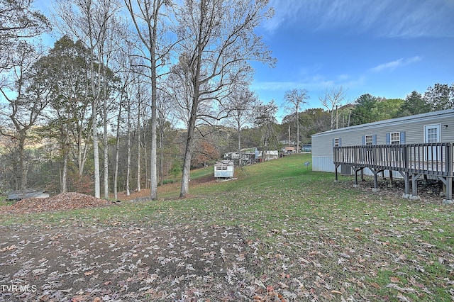 view of yard featuring a deck