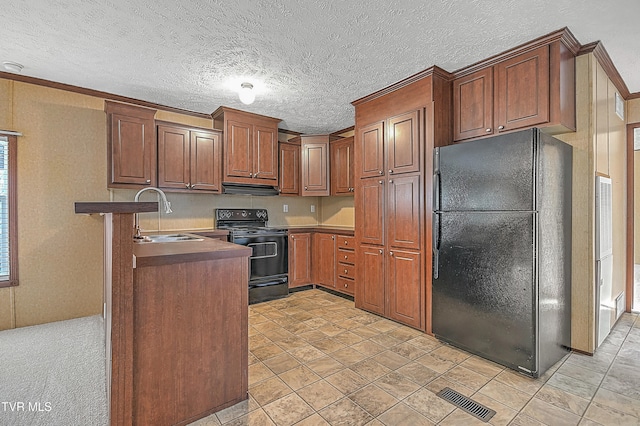 kitchen with black appliances, ventilation hood, sink, and a textured ceiling