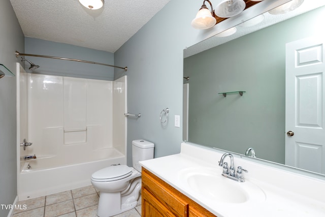 full bathroom featuring tile patterned flooring, vanity, a textured ceiling, and toilet