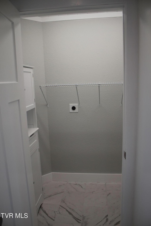 laundry room featuring electric dryer hookup