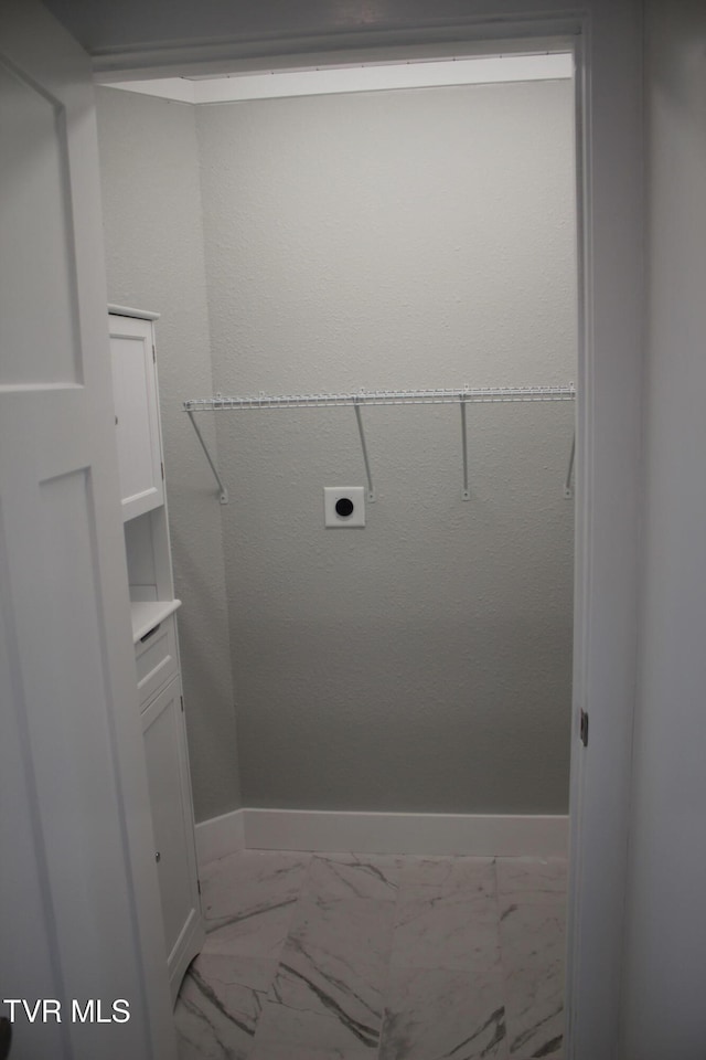 laundry area with electric dryer hookup