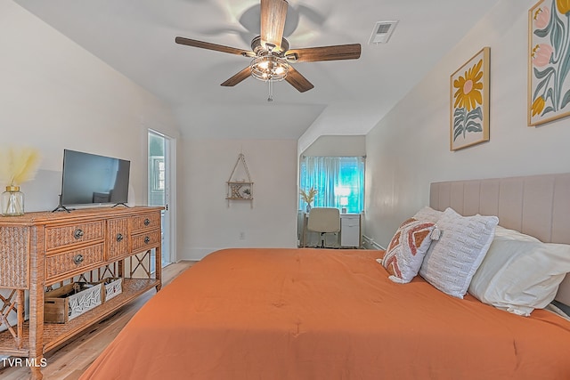 bedroom with ceiling fan and light hardwood / wood-style flooring