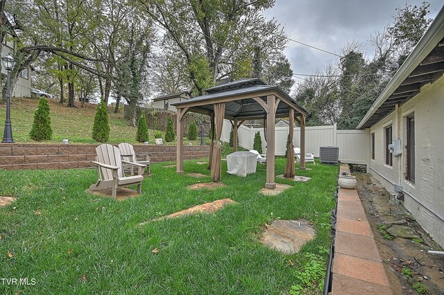 view of yard featuring a gazebo and cooling unit