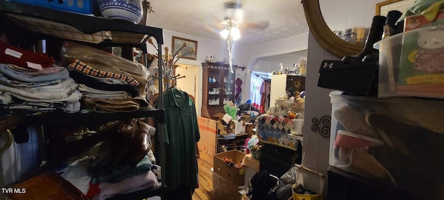 interior space featuring ceiling fan