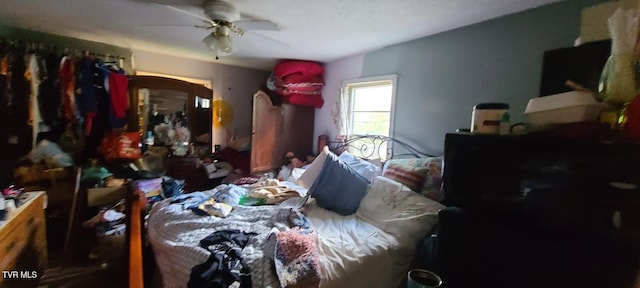 bedroom featuring ceiling fan