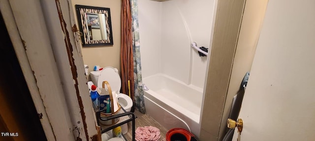 bathroom with shower / bathtub combination with curtain