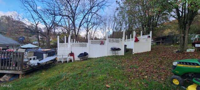 view of yard featuring a wooden deck