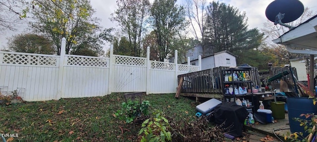 view of yard featuring a deck