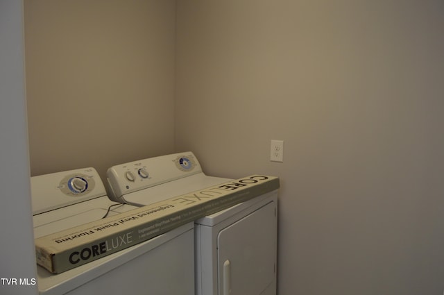 laundry room featuring washer and dryer