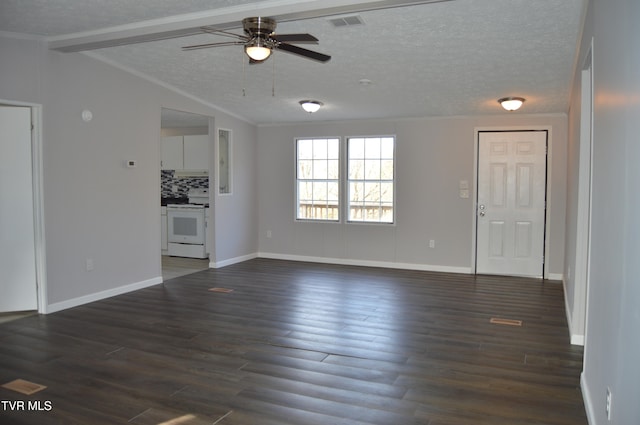 unfurnished living room featuring ornamental molding, ceiling fan, dark hardwood / wood-style floors, a textured ceiling, and lofted ceiling with beams