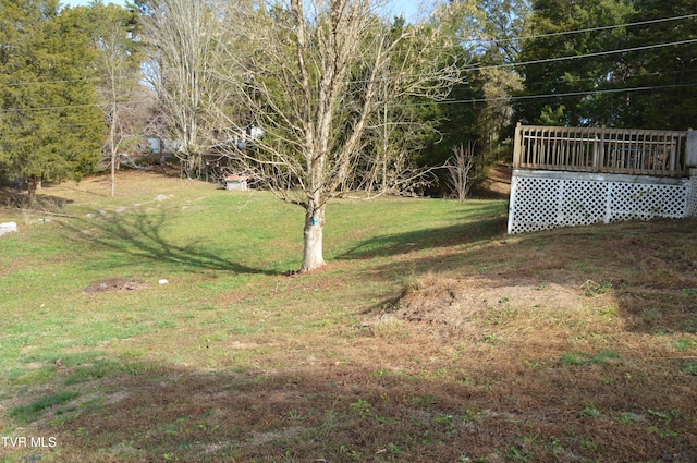 view of yard with a deck