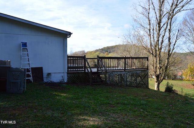 view of yard featuring a deck