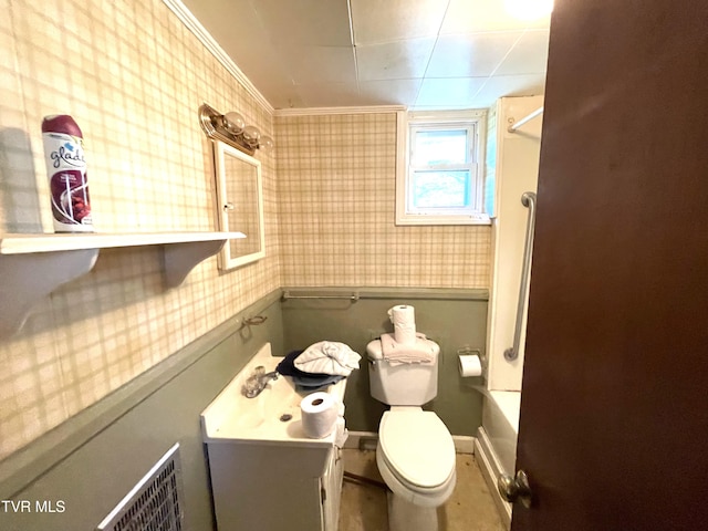 bathroom featuring vanity, toilet, and crown molding