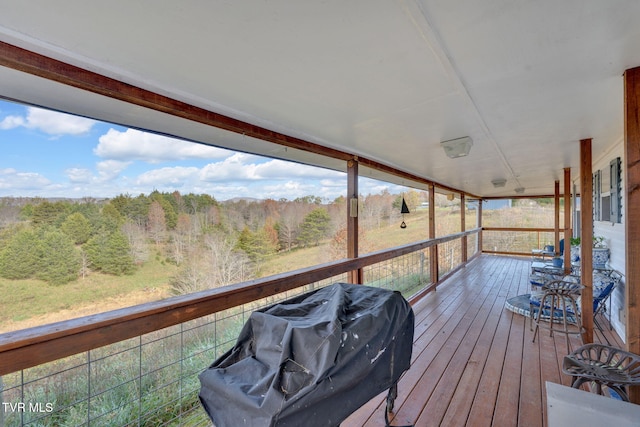 wooden deck with area for grilling