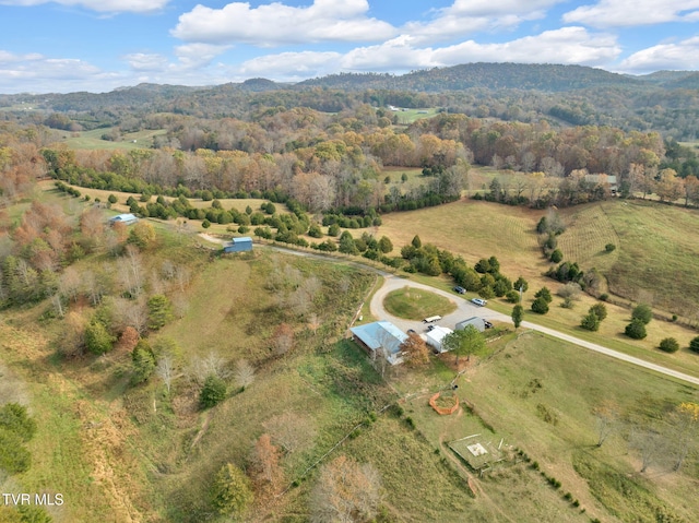 aerial view featuring a mountain view and a rural view