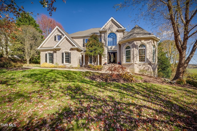 view of front of house with a front lawn