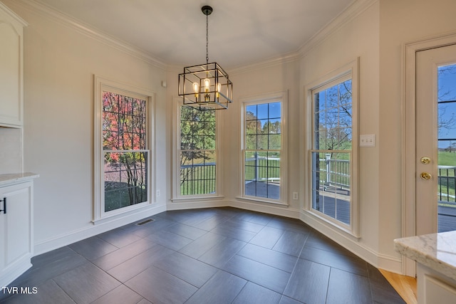 unfurnished dining area with a chandelier and crown molding