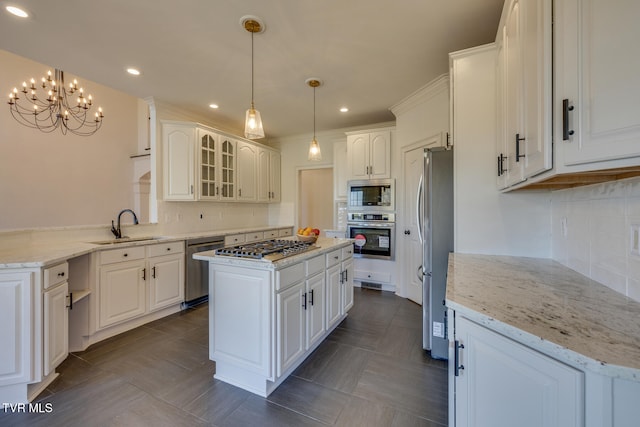 kitchen featuring a center island, white cabinets, and stainless steel appliances