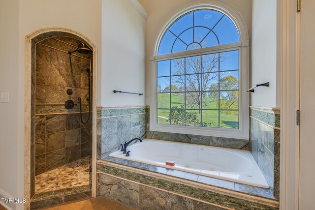 bathroom featuring shower with separate bathtub and tile patterned floors