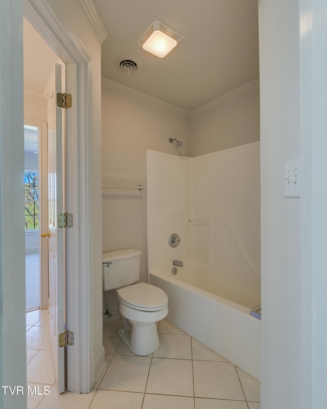 bathroom with shower / washtub combination, tile patterned flooring, toilet, and ornamental molding