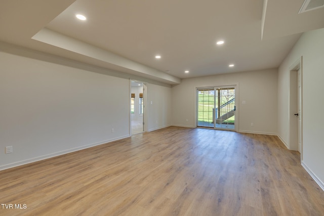 unfurnished room featuring light hardwood / wood-style flooring