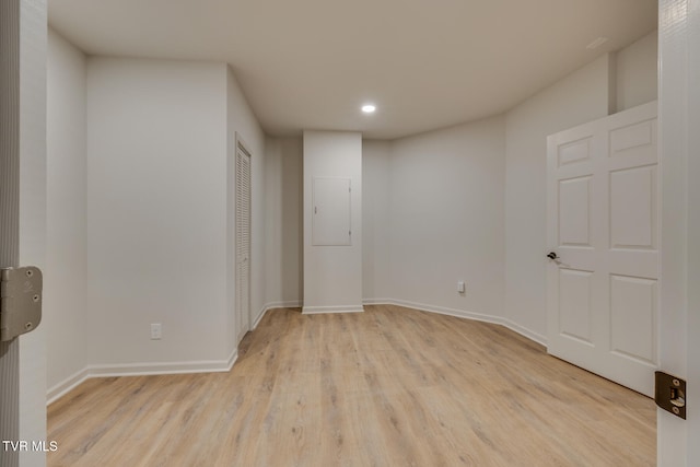 unfurnished room featuring light hardwood / wood-style flooring