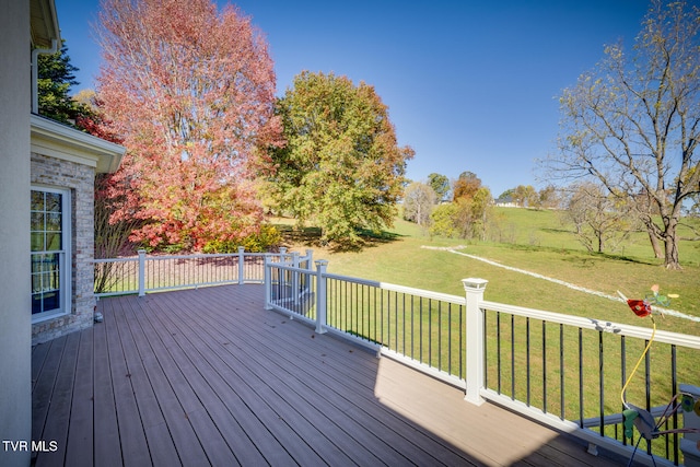 deck featuring a yard