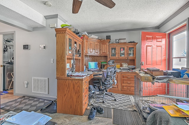 office space featuring ceiling fan, crown molding, and a textured ceiling