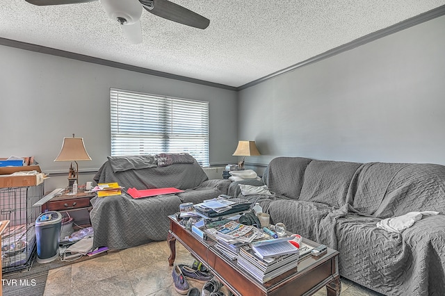 living room featuring a textured ceiling, ceiling fan, and crown molding