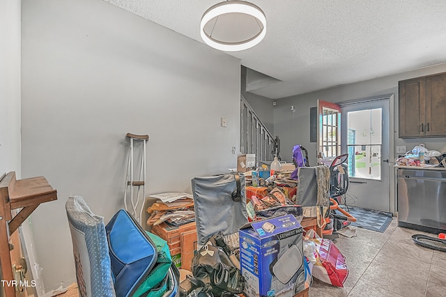 interior space featuring a textured ceiling