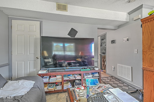 office featuring carpet floors and a textured ceiling