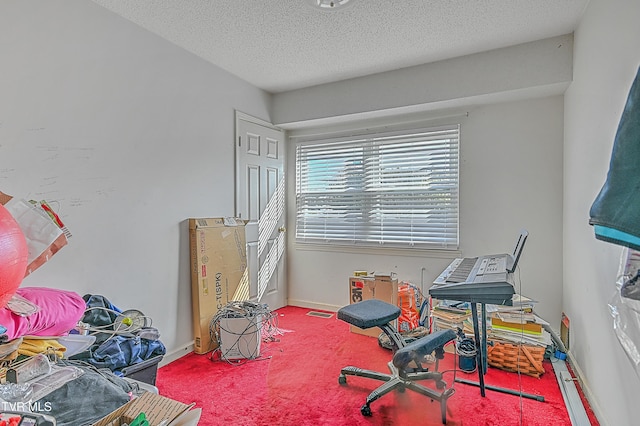 interior space featuring a textured ceiling