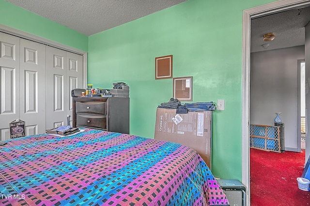 106 W Chilhowie Ave Unit 1, Johnson City, TN 37604 - carpeted bedroom with a textured ceiling and a closet