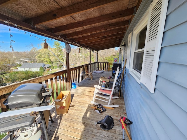 wooden terrace featuring area for grilling