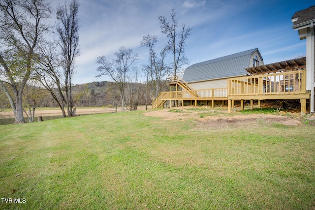 view of yard with a wooden deck