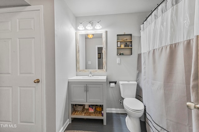 bathroom featuring vanity, toilet, a shower with curtain, and tile patterned flooring